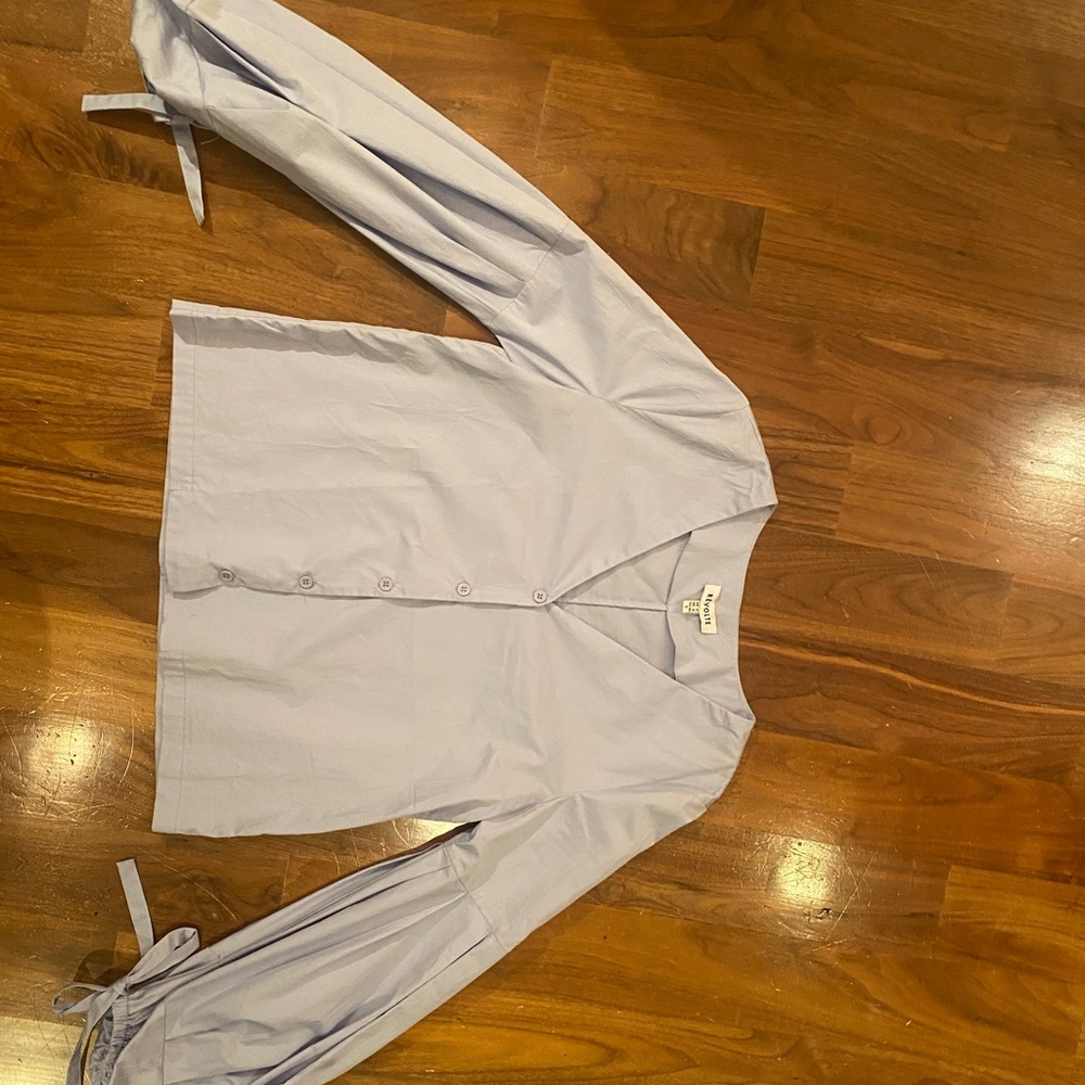 Revolté top with puffy sleeves size 4
